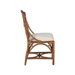 Side view of the Chippendale Side Dining Chair - Tortoise Finish by Kenian, highlighting intricate woven details and a white seat cushion.