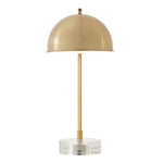 The Romani Desk Lamp by Uttermost features an antique brass finish, gold dome shade, and a clear crystal foot.