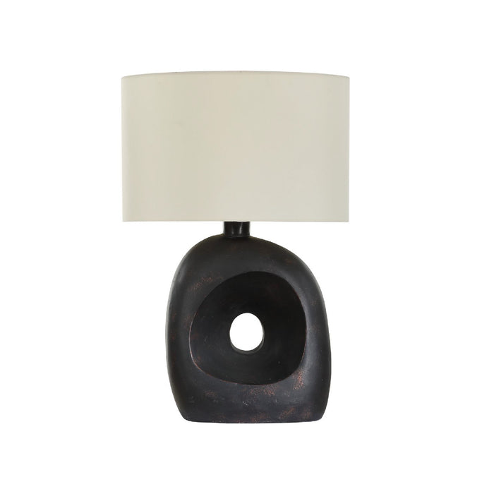 Table lamp with a dark brown and black ceramic base and a white lampshade on a white background