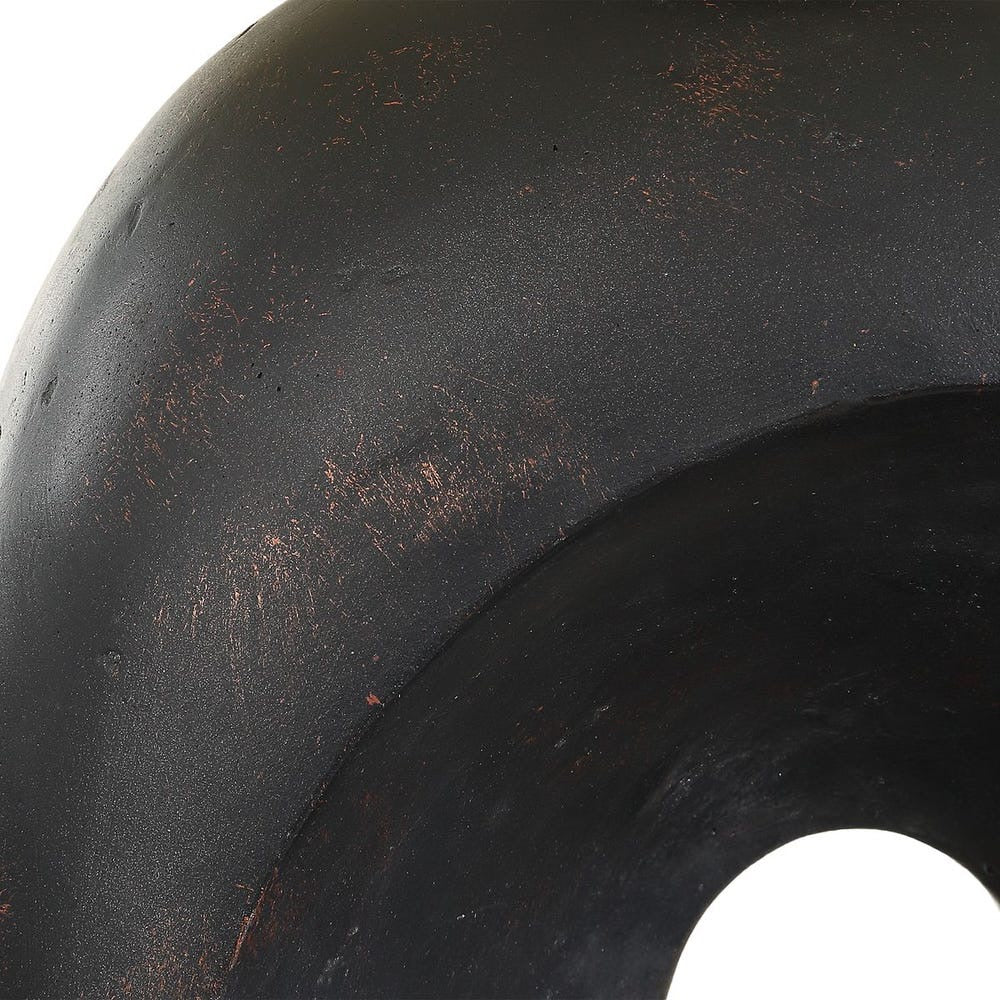 Close-up of a black textured table lamp.