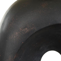 Close-up of a black textured table lamp.