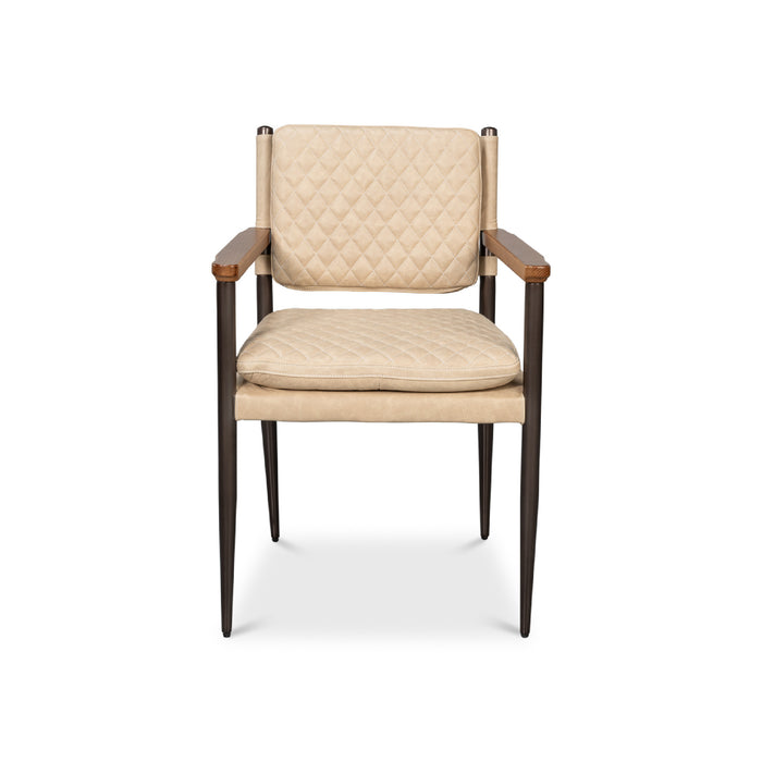 beige quilted leather armchair