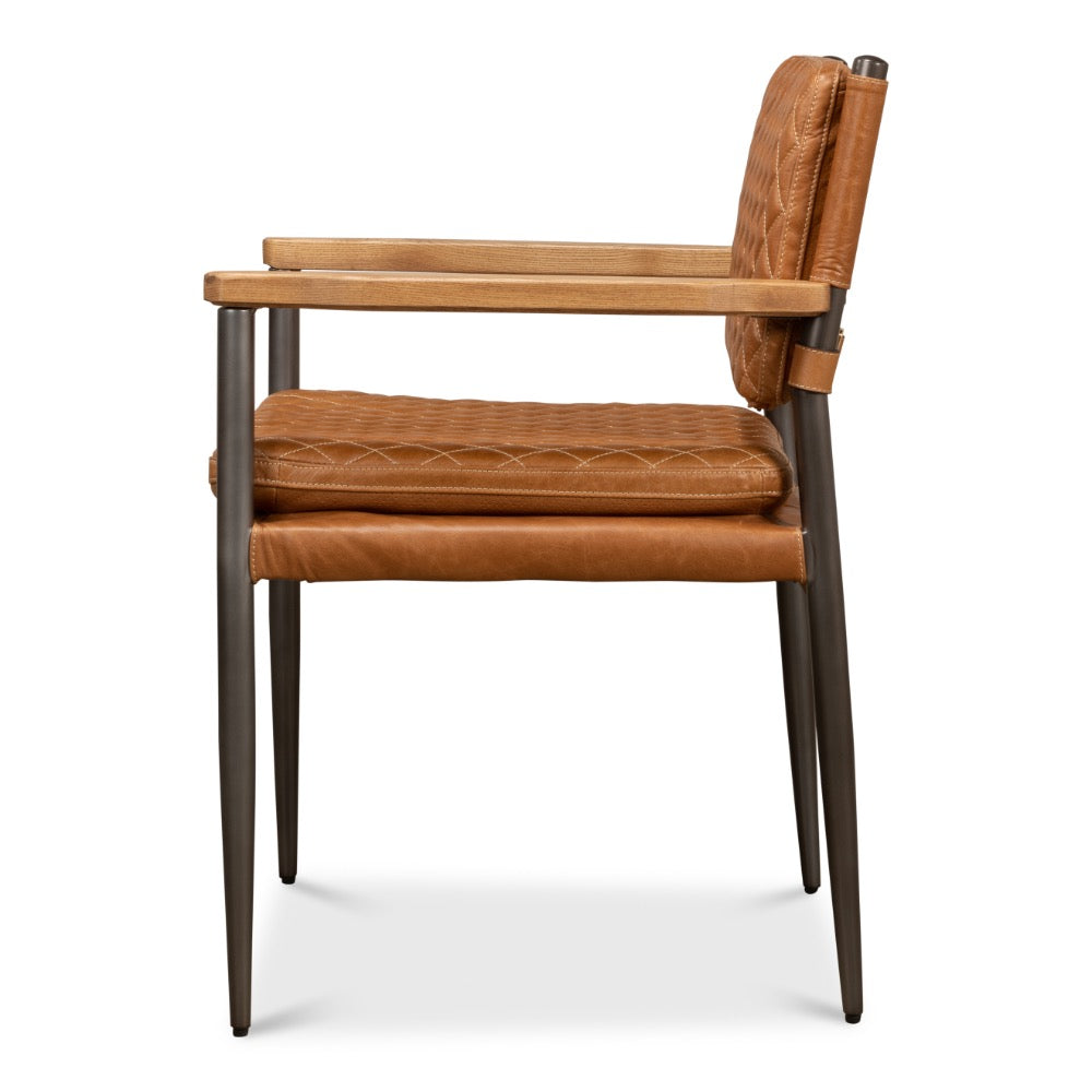 brown quilted leather arm chair metal legs side view