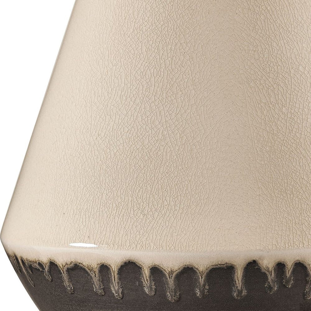 Close-up of a textured ceramic vase with a white background