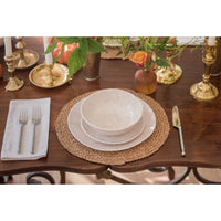 Elegant table set with Always Relish Weave Cream Melamine Salad Plates, white dishes, woven placemat, and flowers.