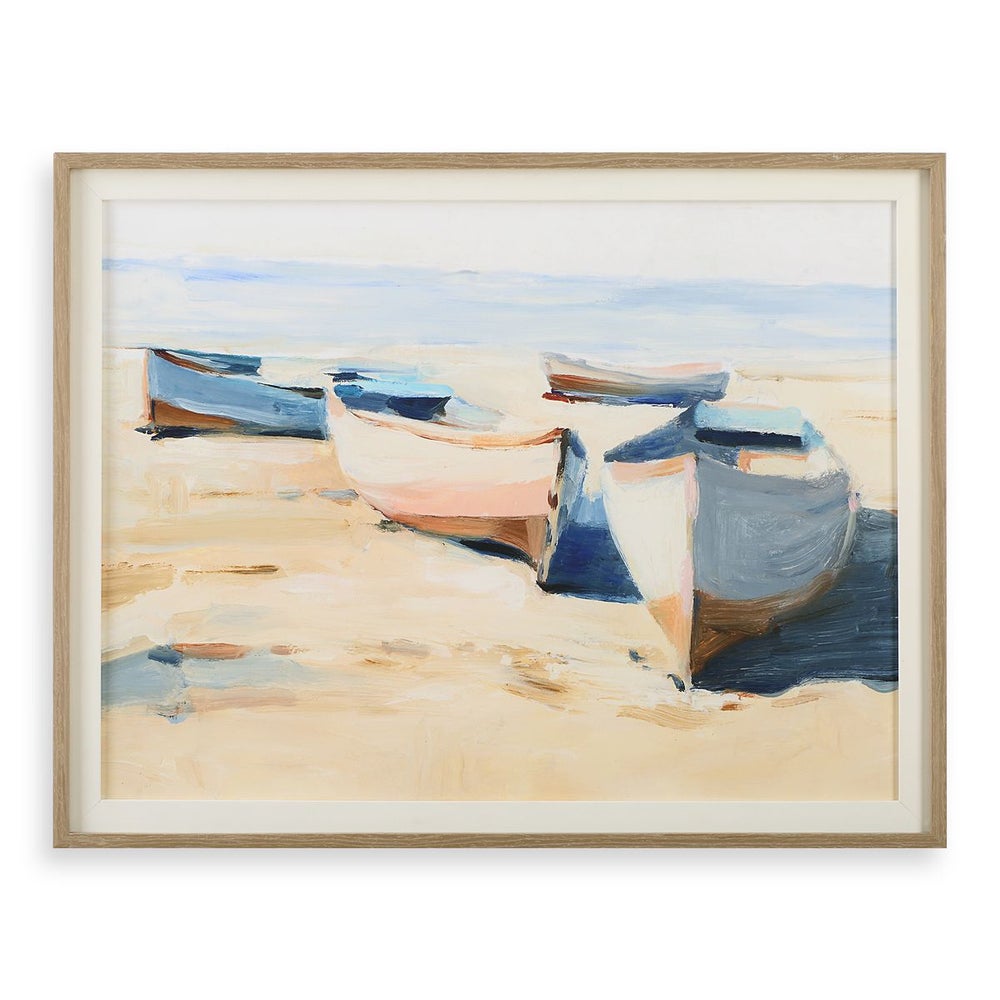 Uttermost's Beached Boats Framed Print features five pastel boats on a serene sandy beach under a light blue sky.