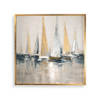 Framed artwork of sailboats with gold and white sails on a water background