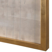 Close-up of a textured wall with a gold frame on a white background