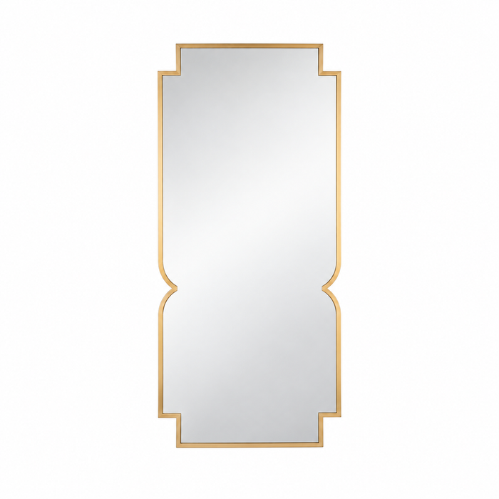 Cadence Cinched Mirror: a rectangular wall mirror with notched corners and a brushed brass frame.