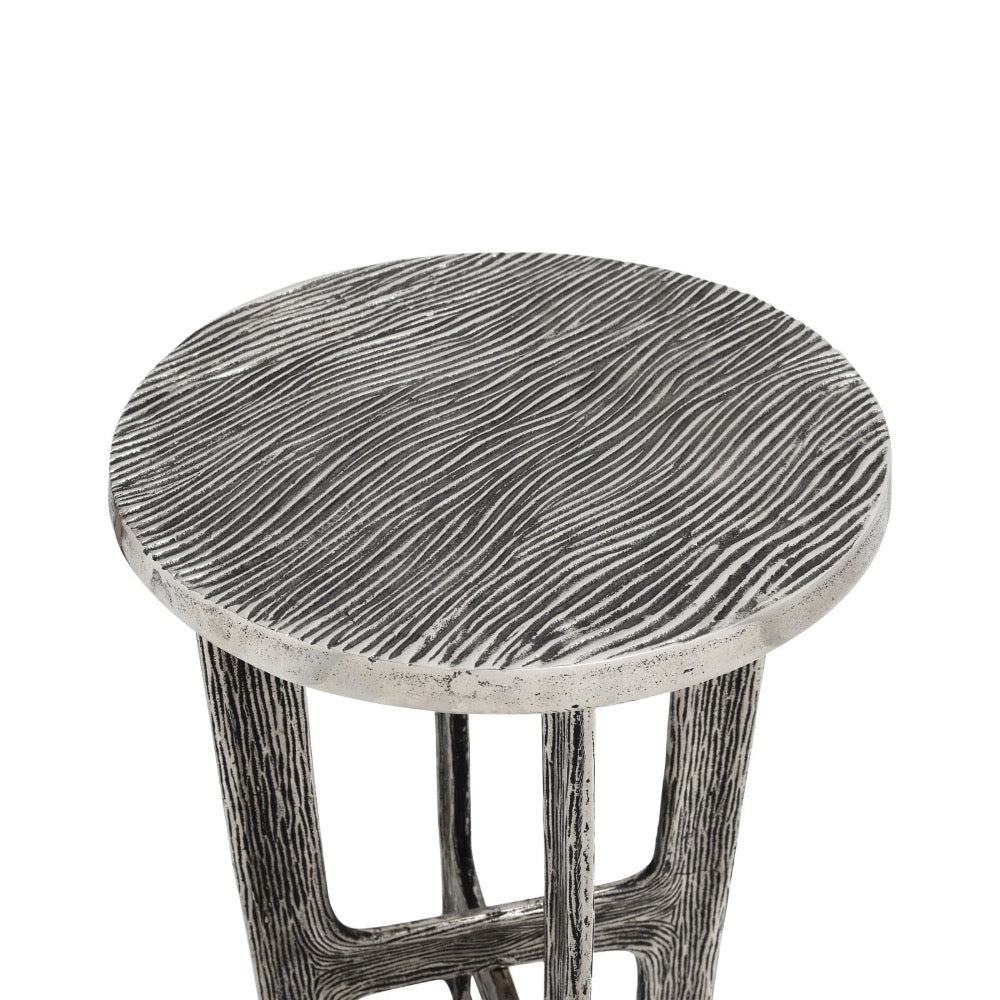 A round side table with a textured, distressed gray and white wood grain finish, shown against a plain white background.