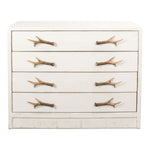 Antler pulls on a distressed off-white painted 4-drawer dresser