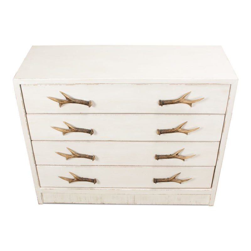 Antler pulls on a distressed off-white painted 4-drawer dresser
