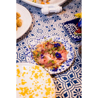 Sashimi with microgreens and edible flowers on an Abigails Beach Chic Cabana Tablecloth.