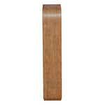 Side view of the Achley Etagere by Uttermost, a tall wooden cabinet with curved top and elegant mango veneer.