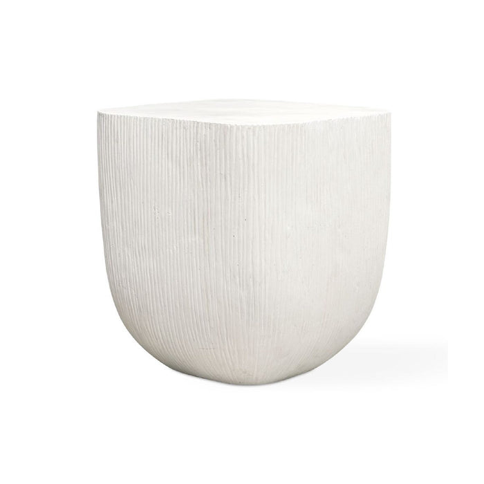 White textured side table on a white background