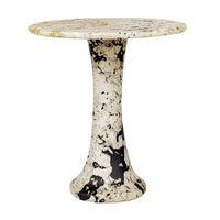 Marble-patterned side table on a white background