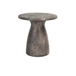 The Collins Concrete Accent Table by Classic Home features a rust finish and hourglass base, perfect for outdoor spaces.