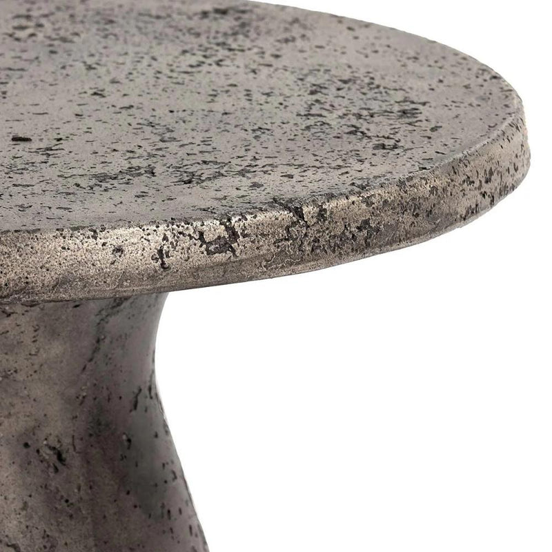 Close-up of the Collins Concrete Accent Table by Classic Home—textured, weathered finish, great for outdoor spaces.