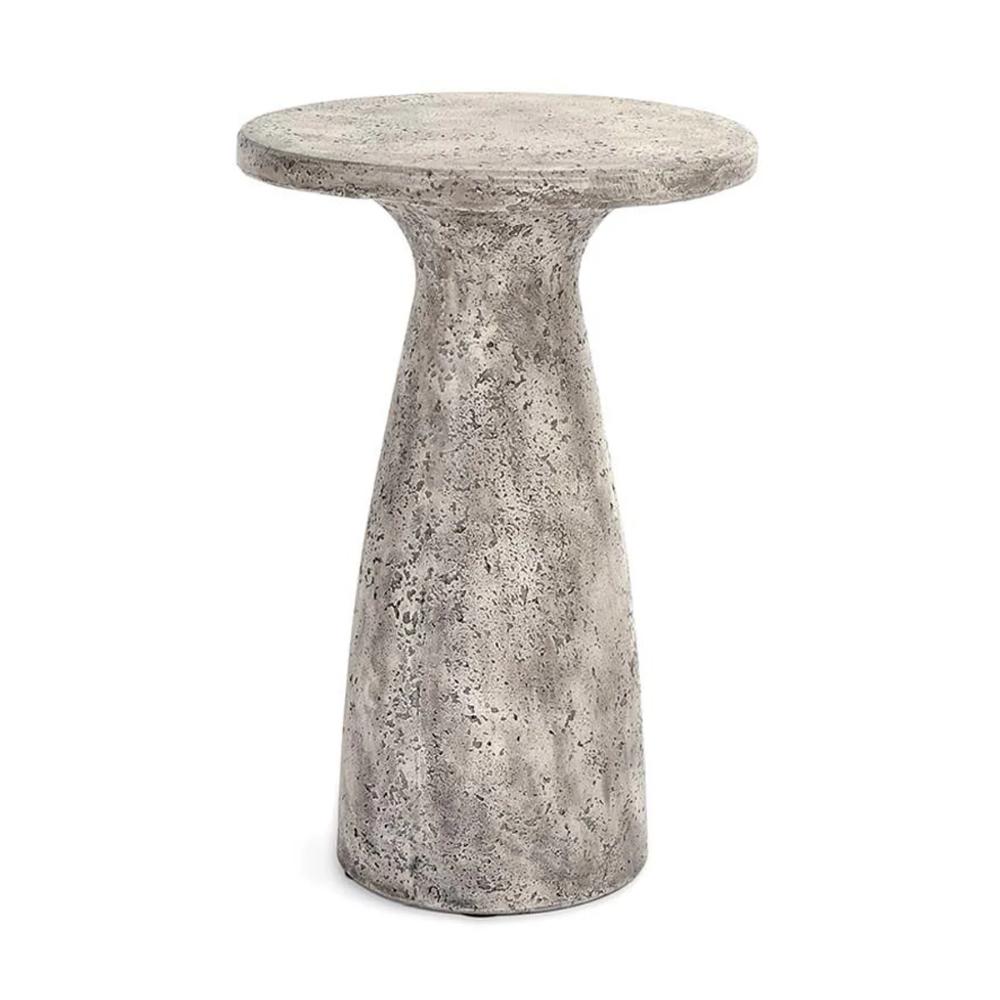 The Collins Concrete Accent Table by Classic Home features a textured gray finish and tapered base, ideal for outdoors.
