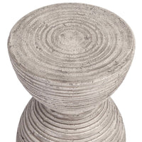 The Classic Home Corey Outdoor Accent Table is a round, ridged fiberglass-reinforced concrete patio or porch stool.