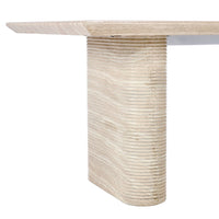 Dining table with a textured, ribbed base on a white background