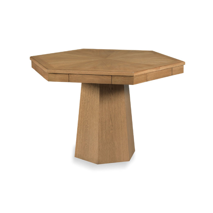 Hexagonal wooden dining table with a natural oak finish, featuring a geometric pedestal base and a slightly angled top view, shown on a plain white background.