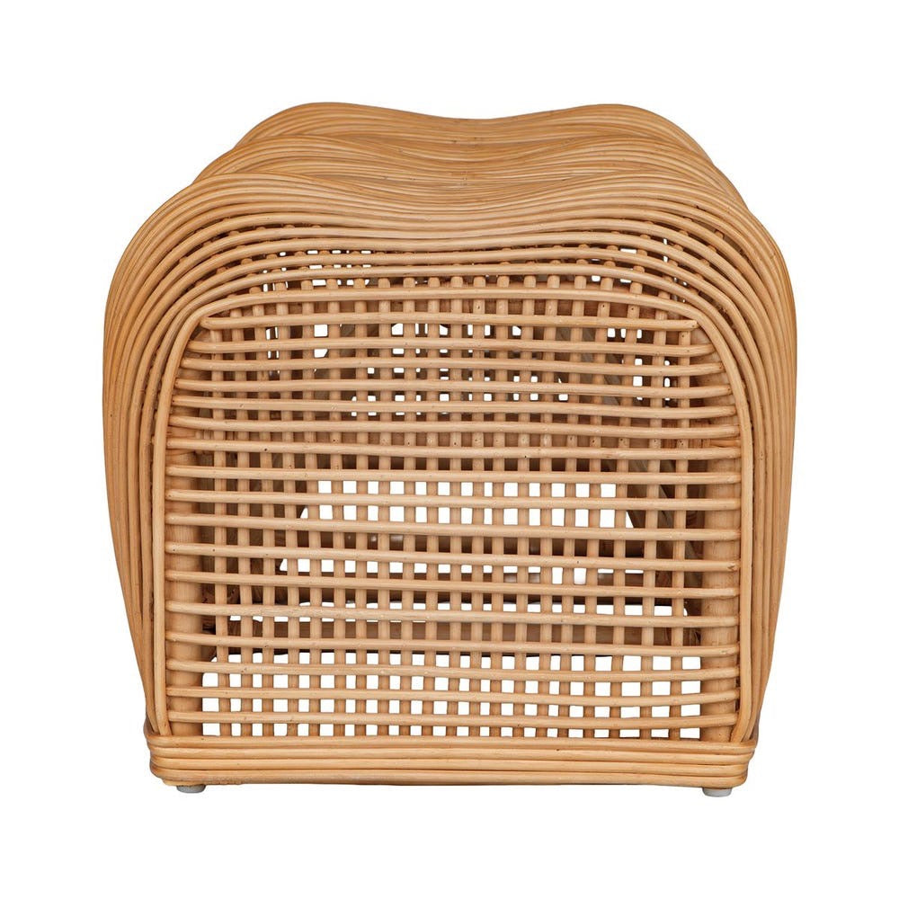 A natural light brown woven rattan or wicker bench with a wavy, rounded top and curved front slatted design, shown against a plain white background.