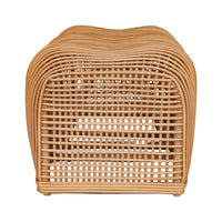 A natural light brown woven rattan or wicker bench with a wavy, rounded top and curved front slatted design, shown against a plain white background.
