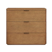 A three-drawer wooden nightstand or end table with a warm medium-brown wood grain finish and slim dark metal drawer pulls, shown against a plain white background.