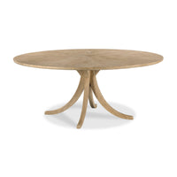 A round wooden dining table with a light oak finish, featuring a natural wood grain top and three curved legs that converge at the center, shown on a white background.
