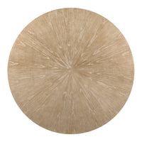 Set the Aerial Rift Dining Table by Woodbridge Furniture on a beige rug with radiating lines for a sunburst-inspired look.
