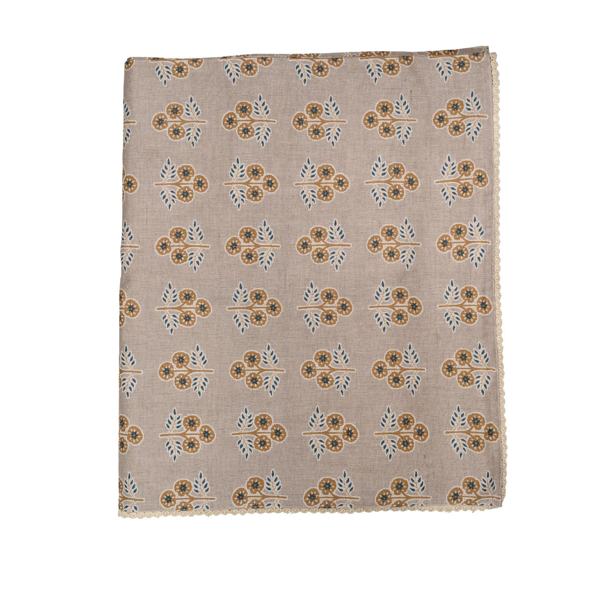 A square fabric folded tablecoth with a beige background, featuring a repeating block-print style floral pattern in brown, mustard yellow, and light blue.