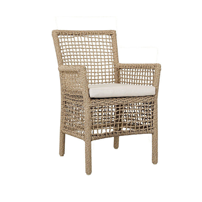 Woven chair with a white cushion on a white background