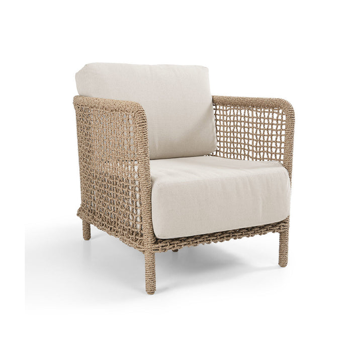 Wicker armchair with white cushion on a white background