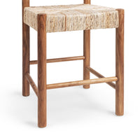 A wooden stool with a woven natural fiber seat, shown from a three-quarter angle against a plain white background.