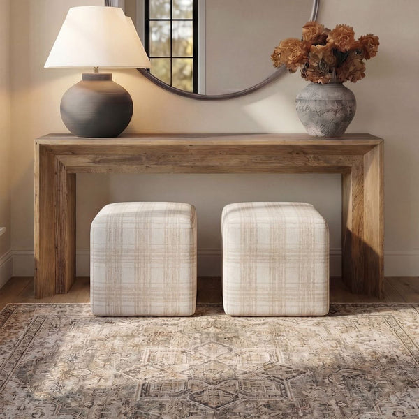 Wooden console table with decorative items in a room setting
