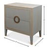 The Storm Grey Shagreen Bedside Table by Sarreid, Ltd. features a gray rectangular design with gold leather piping accents, two drawers, and round handles. Dimensions: 30" height, 30" width, 18" depth—ideal for bedside storage.