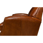 brown leather lounge chair nail heads