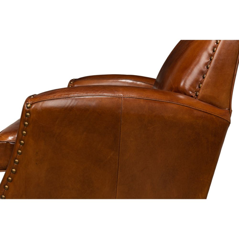 brown leather lounge chair nail heads