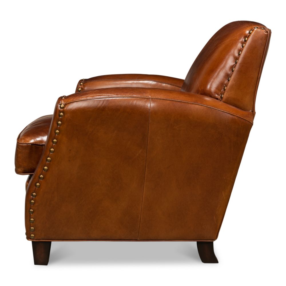brown leather lounge chair nail heads