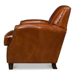 brown leather lounge chair nail heads