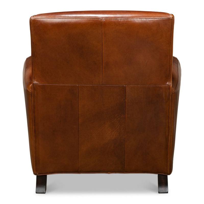 brown leather lounge chair nail heads