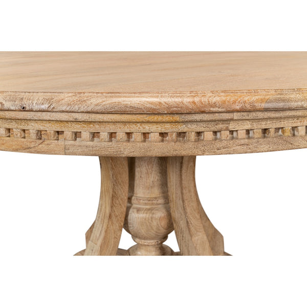 Round wooden table with decorative legs on a white background