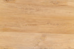 The Sienna finish on the Guillermo Pedestal Kitchen Table by Sarreid, Ltd. enhances the wood's grain and light brown hue.