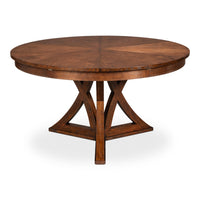 The Sarreid, Ltd. Casual Paldao Finish Medium Jupe Dining Table features a round top and geometric pedestal base.