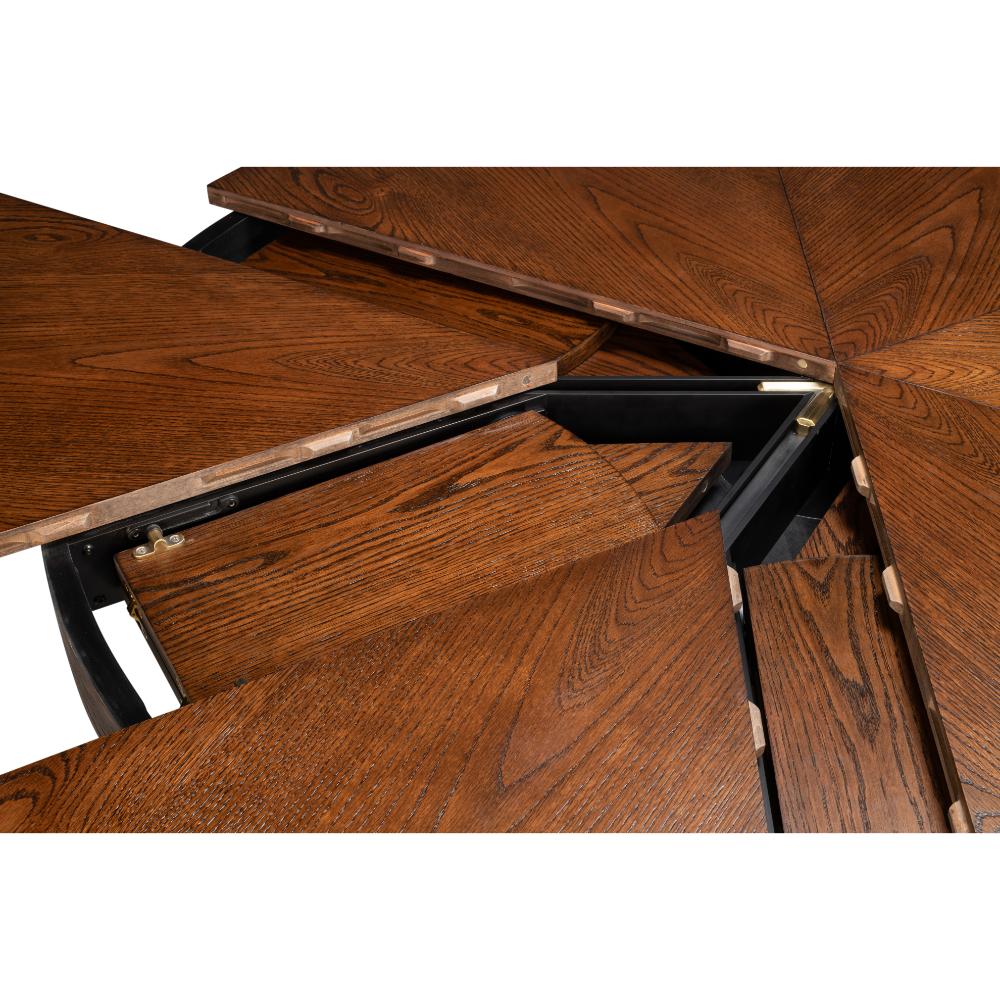 The Sarreid, Ltd. Casual Paldao Finish Medium Jupe Dining Table features a round top and geometric pedestal base.