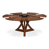 The Sarreid, Ltd. Casual Paldao Finish Medium Jupe Dining Table features a round top and geometric pedestal base.