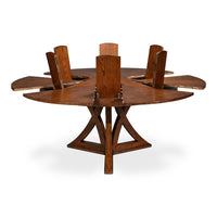 The Sarreid, Ltd. Casual Paldao Finish Medium Jupe Dining Table features a round top and geometric pedestal base.