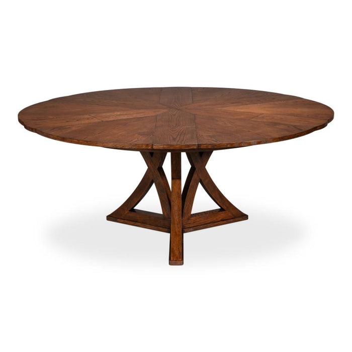 The Sarreid, Ltd. Casual Paldao Finish Medium Jupe Dining Table features a round top and geometric pedestal base.
