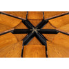 Wooden segments radiate from a black metal hub, forming a star pattern on Sarreid's Casual Tobacco Jupe Dining Table.